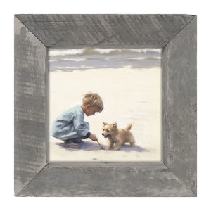 Boy with Dog On Beach