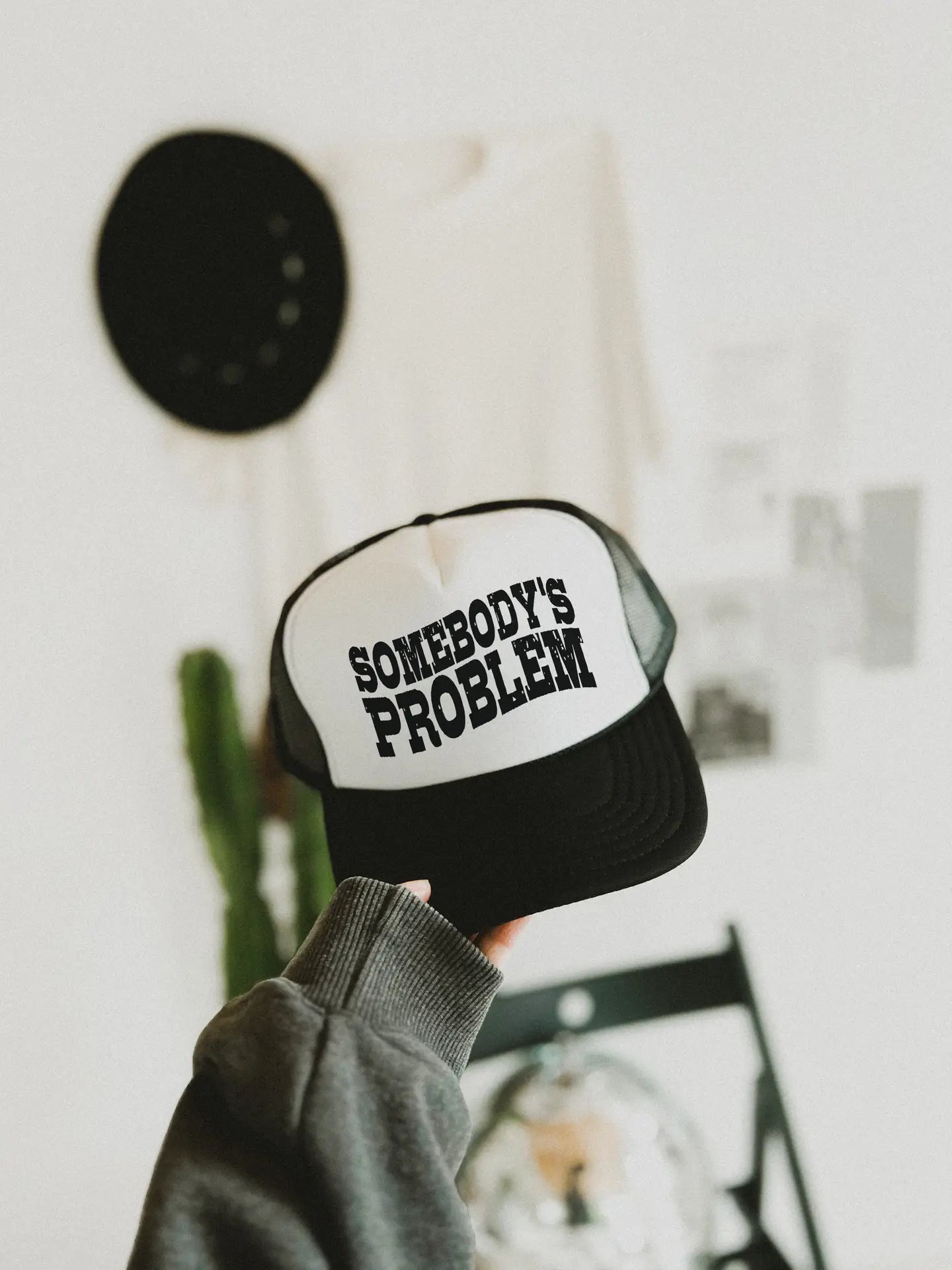 Somebody’s Problem Trucker Hat